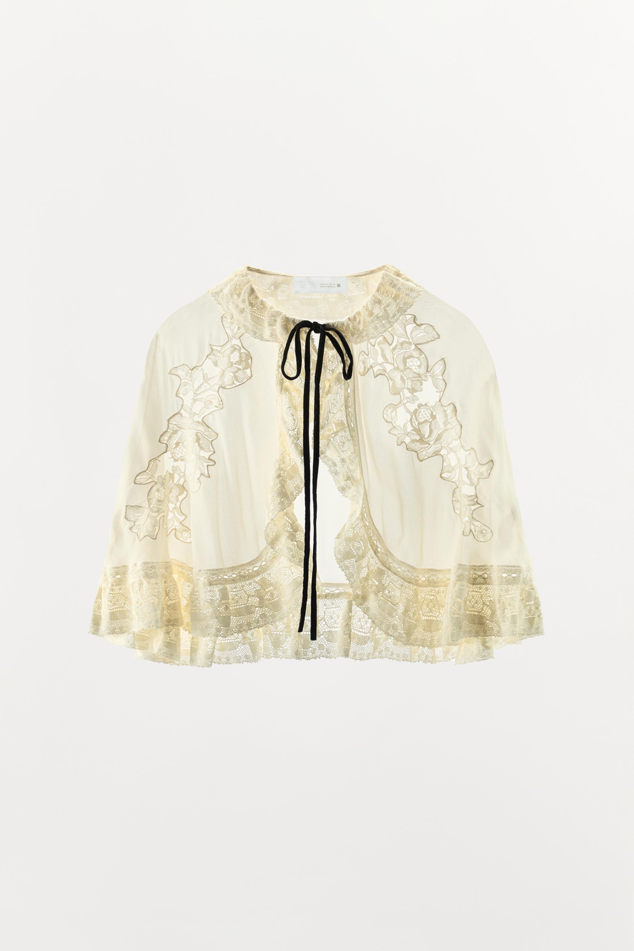 CAPE EN DENTELLE À NŒUD EN CONTRASTE